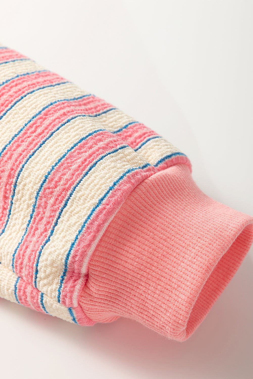 Red striped long sleeve top by Mommas Hive featuring a V-neck, collared design, buttoned front, and drop shoulder style.