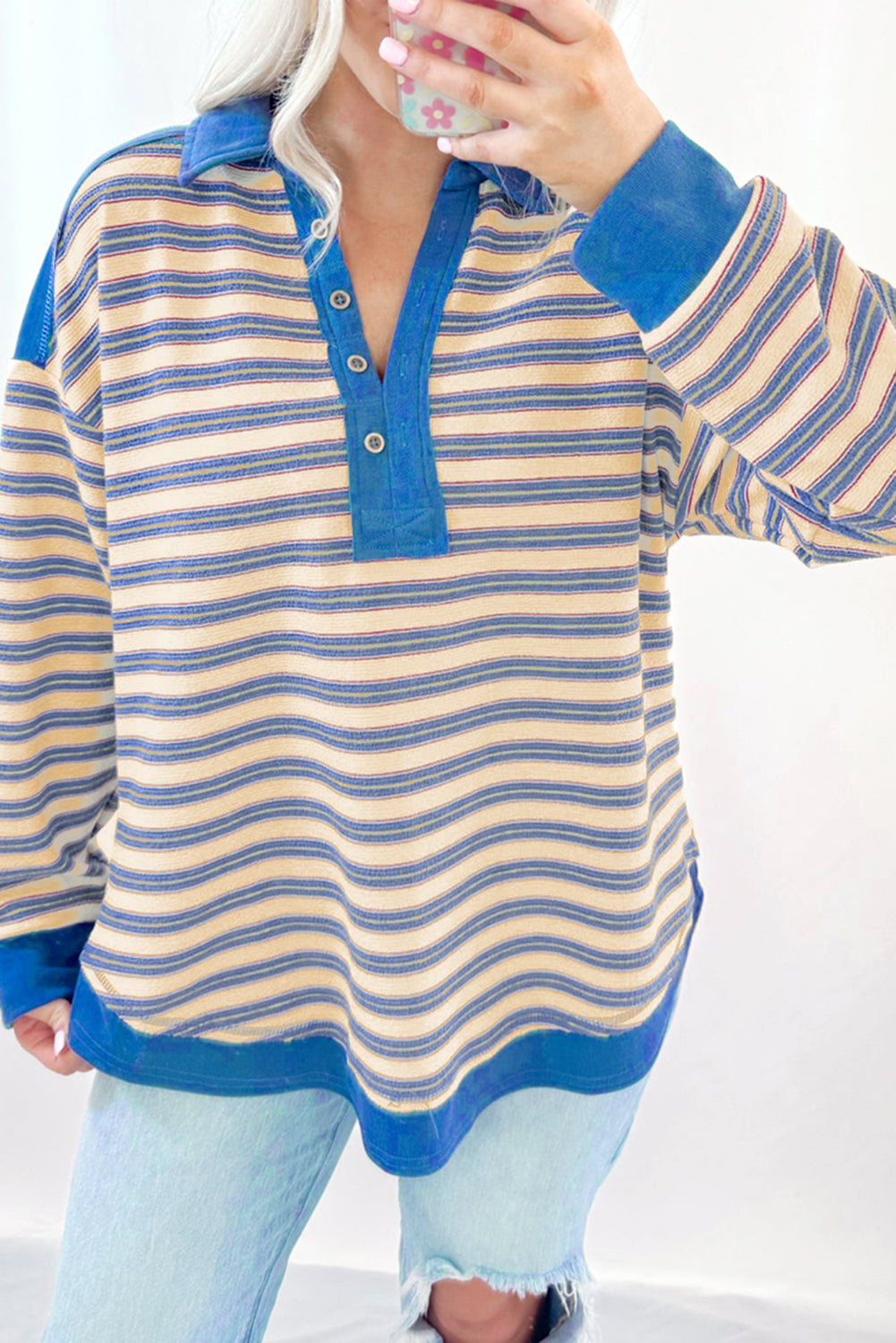 Red striped long sleeve top from Mommas Hive featuring a buttoned V-neck, collared neckline, and drop shoulder design.