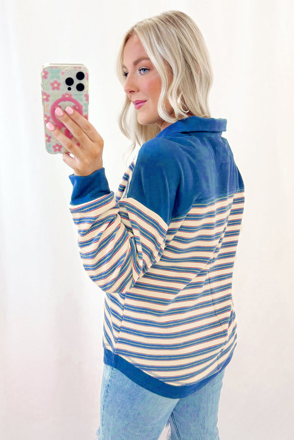 Red striped long sleeve top by Mommas Hive with V-neck, buttoned front, collared design, and drop shoulder style.