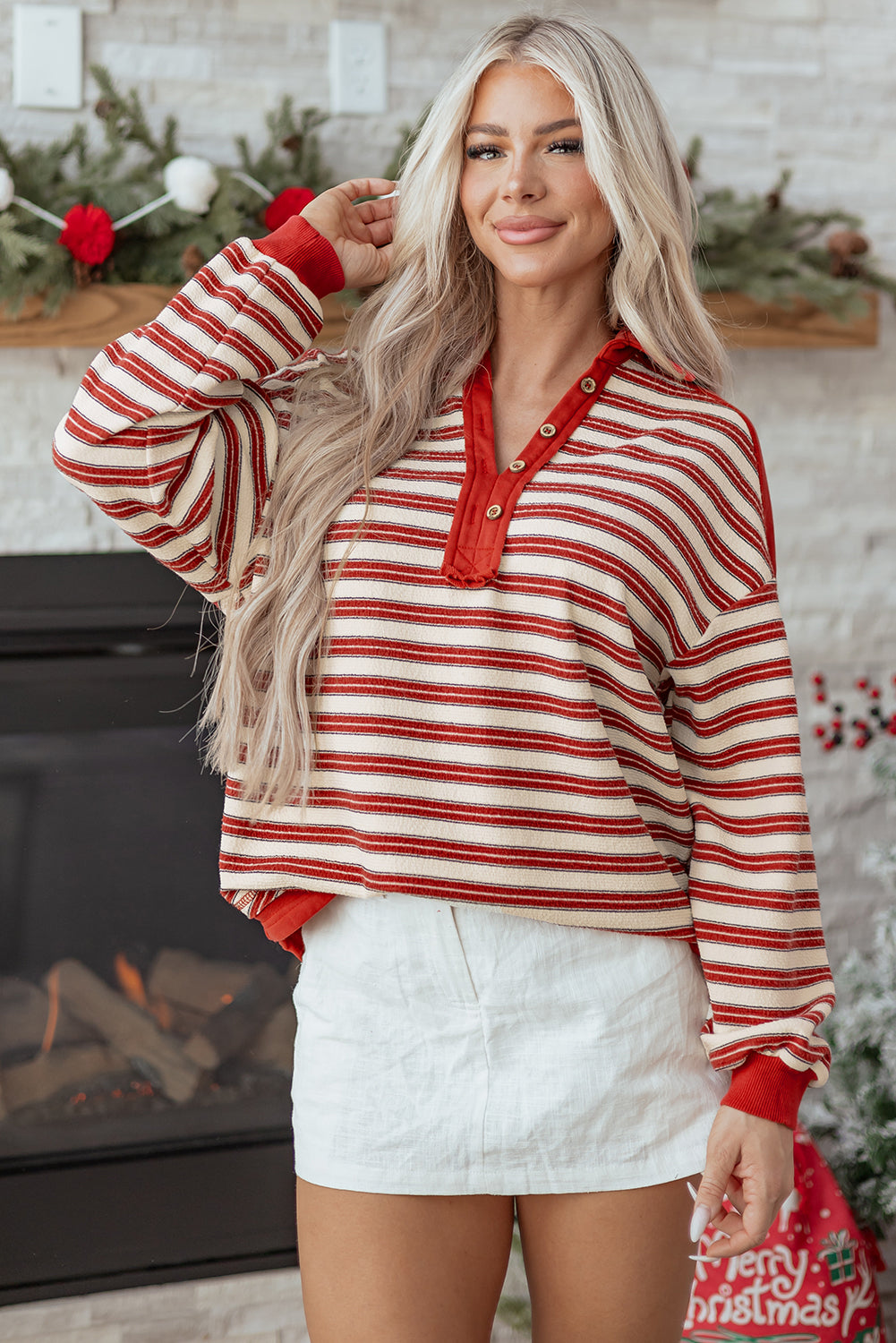 Red Stripe Mommas Hive long sleeve top with V-neck, buttoned collar, and drop shoulder, made of polyester and elastane.