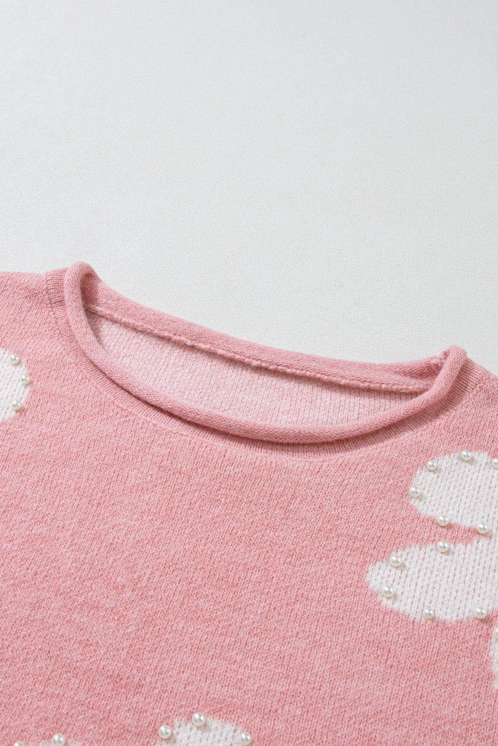 Multicolour pearl beaded floral drop shoulder sweater by Mommas Hive, featuring vibrant floral design and cozy knit fabric.