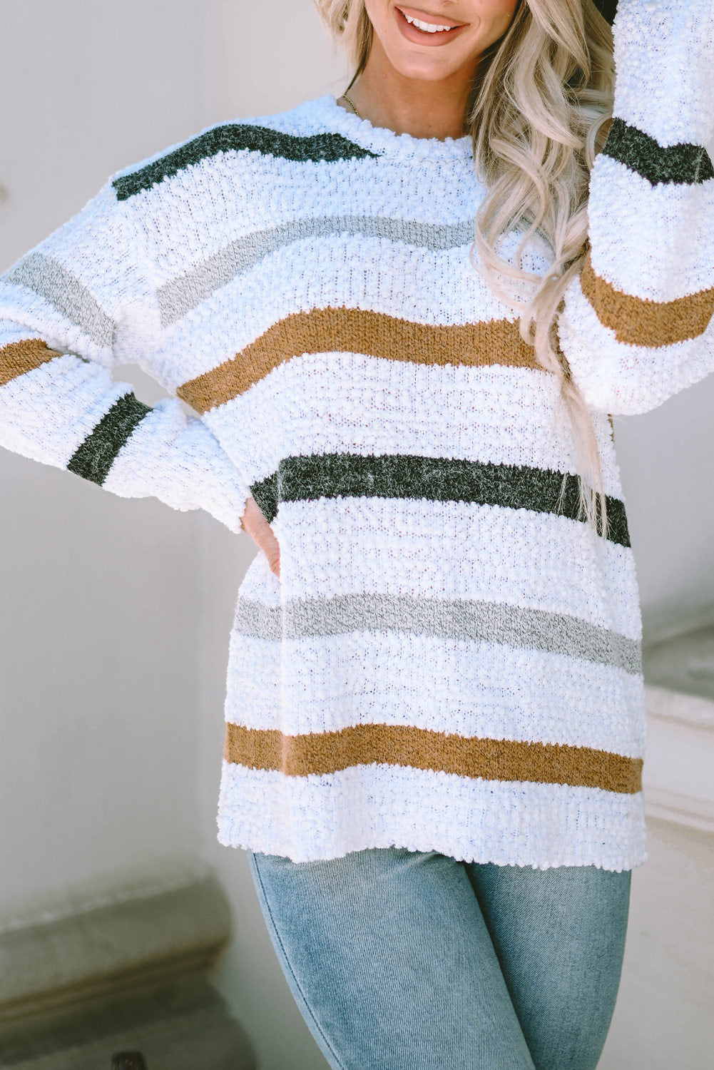 Striped popcorn knit sweater from Mommas Hive, featuring a cozy design in mixed polyester, acrylic, and polyamide fibers.