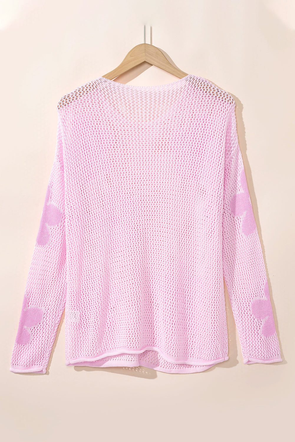 Light pink Mommas Hive sweater with large flower knit pattern, drop shoulder style, made of acrylic and cotton, cozy and stylish.