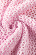 Light pink Mommas Hive sweater with large floral hollow knit design, drop shoulder style, made of acrylic and cotton.