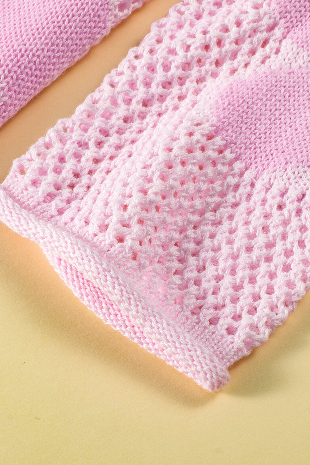 Light pink Mommas Hive knitted sweater with large flower hollow design and drop shoulder style, made from acrylic and cotton blend.