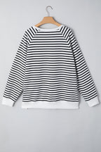 Black stripe raglan sleeve loose sweatshirt by Mommas Hive with side slits and cotton-elastane blend, casual and comfortable top.