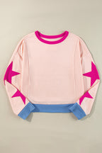 Light pink oversized sweatshirt with star patchwork and exposed seams from Mommas Hive, made of polyester and cotton blend.