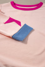 Light pink oversized sweatshirt by Mommas Hive featuring star patchwork and exposed seams, made of polyester and cotton blend.
