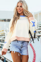 Light pink oversized sweatshirt by Mommas Hive featuring star patchwork, exposed seams, and a cozy, relaxed fit.
