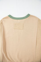 Light pink oversized sweatshirt with star patchwork and exposed seams from Mommas Hive, made of polyester and cotton blend.