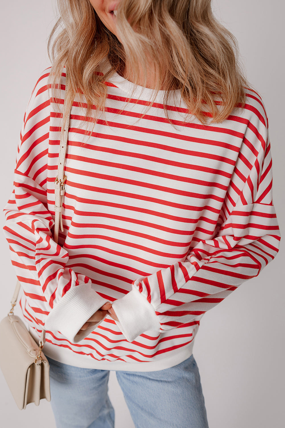 Orange stripe drop shoulder crew neck sweatshirt by Mommas Hive, featuring loose fit, soft polyester and cotton blend fabric.