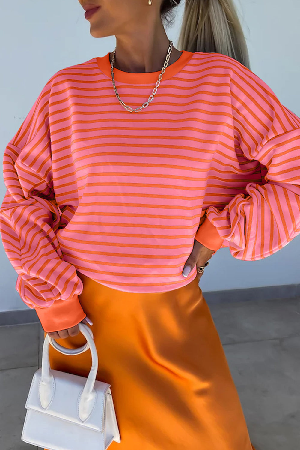 Orange stripe drop shoulder crew neck sweatshirt by Mommas Hive, featuring a loose fit and comfortable fabric blend.
