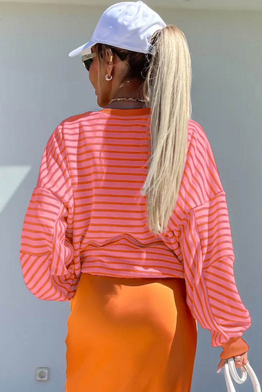 Orange stripe drop shoulder crew neck sweatshirt by Mommas Hive, featuring a loose fit and casual style with polyester, cotton, and elastane.