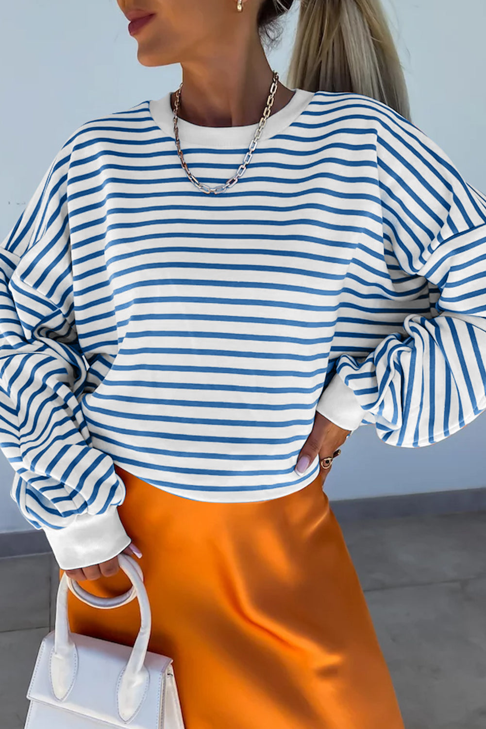 Orange stripe drop shoulder crew neck sweatshirt by Mommas Hive, loose fit, made of polyester, cotton, and elastane.