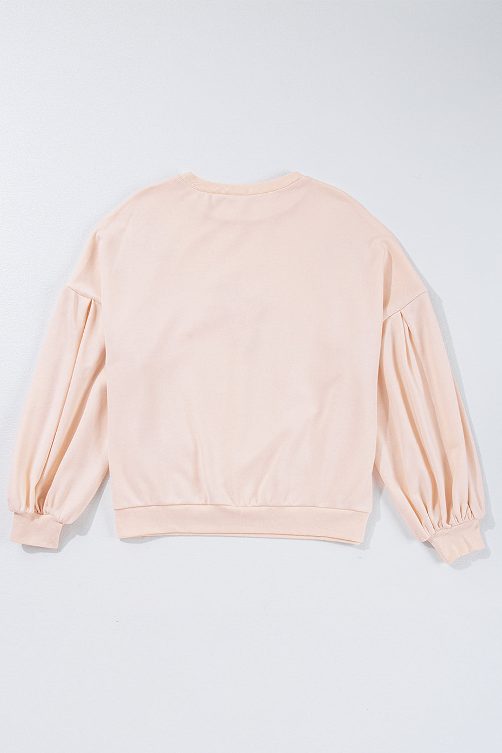 Mommas Hive oversized sweatshirt with parchment color, embroidered bow, lantern sleeves, and cozy pullover style.