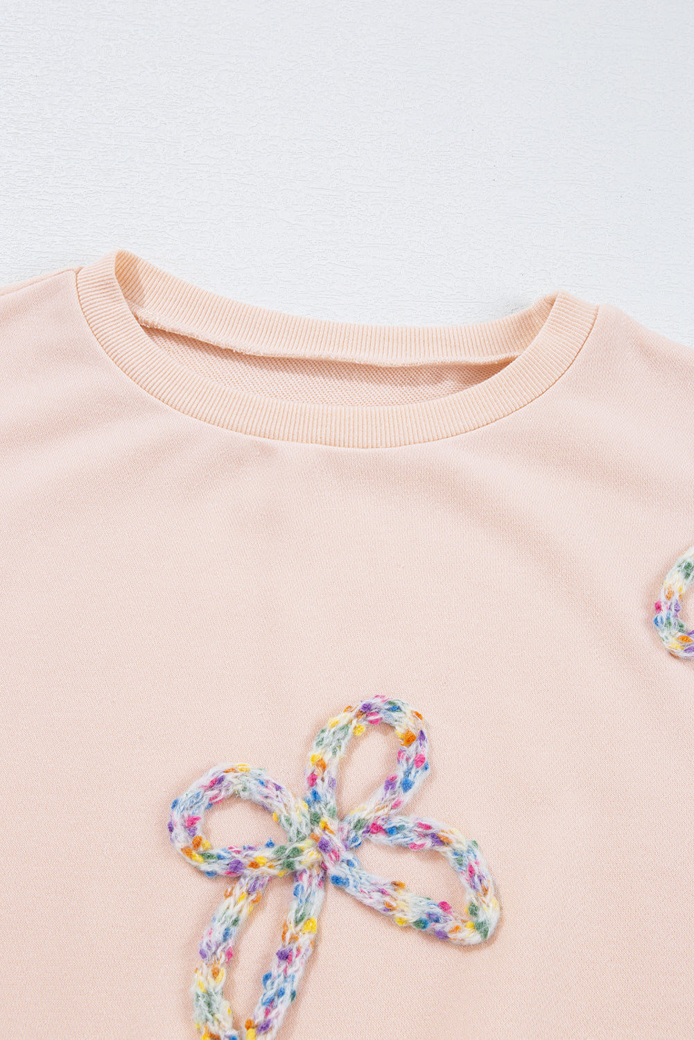 Mommas Hive oversized sweatshirt with parchment color, embroidered bow, lantern sleeves, made of polyester and cotton, casual style.