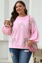 Mommas Hive oversized sweatshirt with parchment-colored fabric, embroidered bow detail and lantern sleeves, casual pullover style.