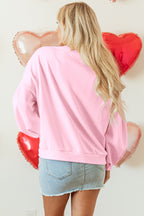 Mommas Hive oversized pullover sweatshirt with parchment color, embroidered bow detail, lantern sleeves, made from polyester and cotton.