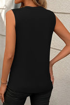 White crew neck pleated tank top from Mommas Hive, featuring a stylish sleeveless design and comfortable fabric blend.
