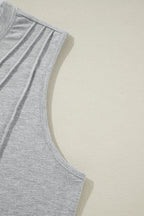 White crew neck pleated tank top from Mommas Hive, featuring a sleeveless design and lightweight fabric with polyester, cotton, and elastane.