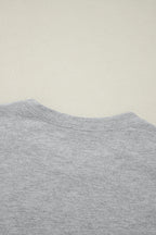 White crew neck pleated tank top by Mommas Hive, made of polyester, cotton, and elastane, displayed on a plain background.