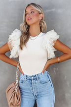 White Dotty Mesh Ruffle Sleeve Ribbed Knit Top from Mommas Hive, featuring ruffle sleeves and a fitted ribbed design.