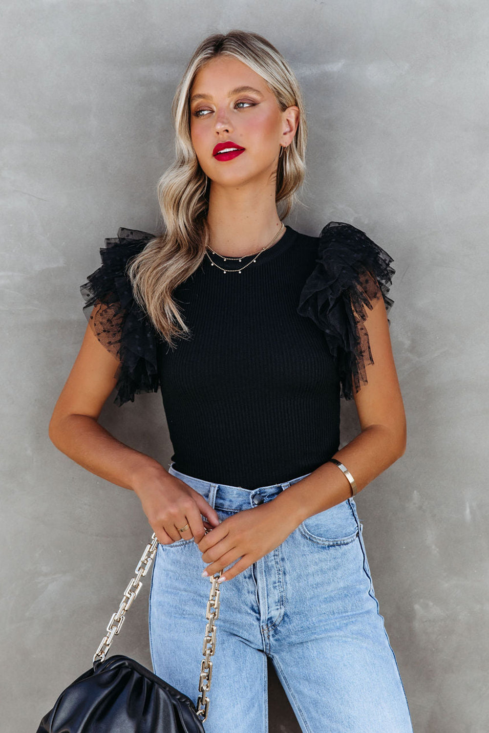 White Dotty Mesh Ruffle Sleeve Ribbed Knit Top by Mommas Hive, featuring textured fabric and stylish ruffle sleeves.