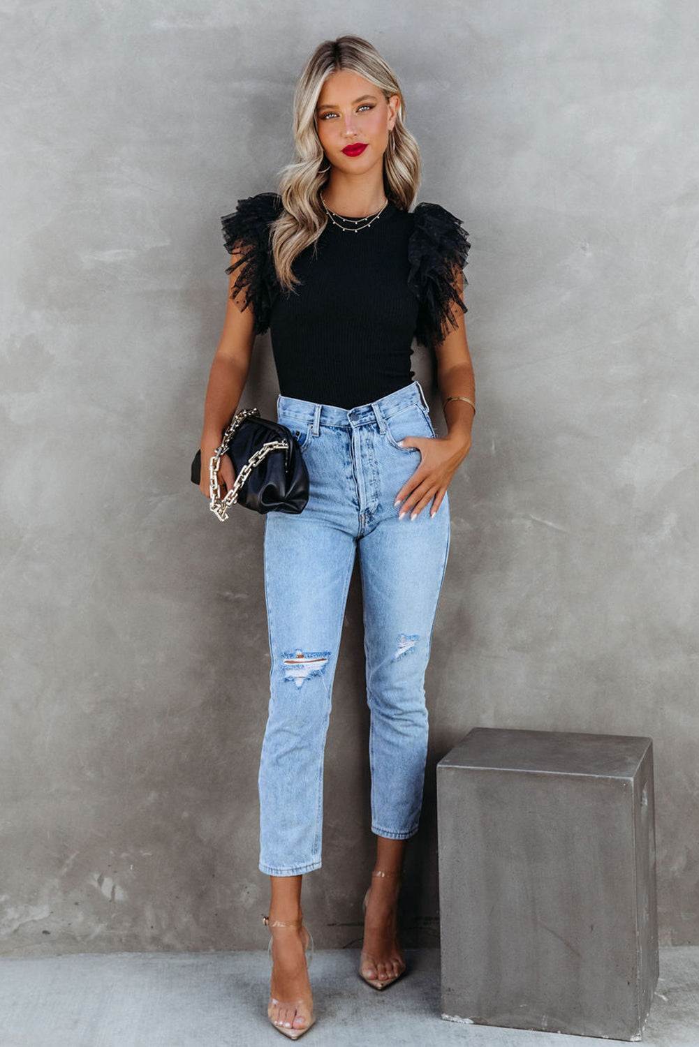 White dotty mesh ruffle sleeve ribbed knit top by Mommas Hive, featuring a fitted design and delicate ruffle detail on sleeves.