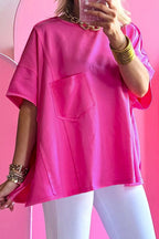 Blue oversized T-shirt by Mommas Hive with patched pocket and exposed seam, made from polyester, cotton, and elastane fabric.