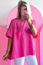 Blue oversized T-shirt with patched pocket and exposed seams from Mommas Hive, made of polyester, cotton, and elastane.