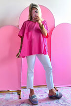 Blue oversized T-shirt by Mommas Hive featuring patched pocket and exposed seam design, made of polyester, cotton, and elastane blend.