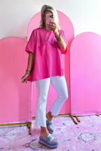 Blue oversized T-shirt by Mommas Hive with patched pocket and exposed seam details, made from polyester, cotton, and elastane blend.