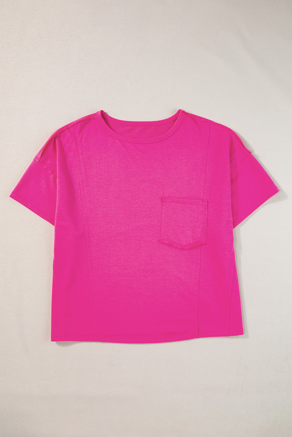 Blue oversized T-shirt with patched pocket and exposed seams from Mommas Hive, made of polyester, cotton, and elastane.