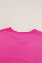Blue oversized T-shirt from Mommas Hive with patched pocket and exposed seam detailing, made of polyester, cotton, and elastane.