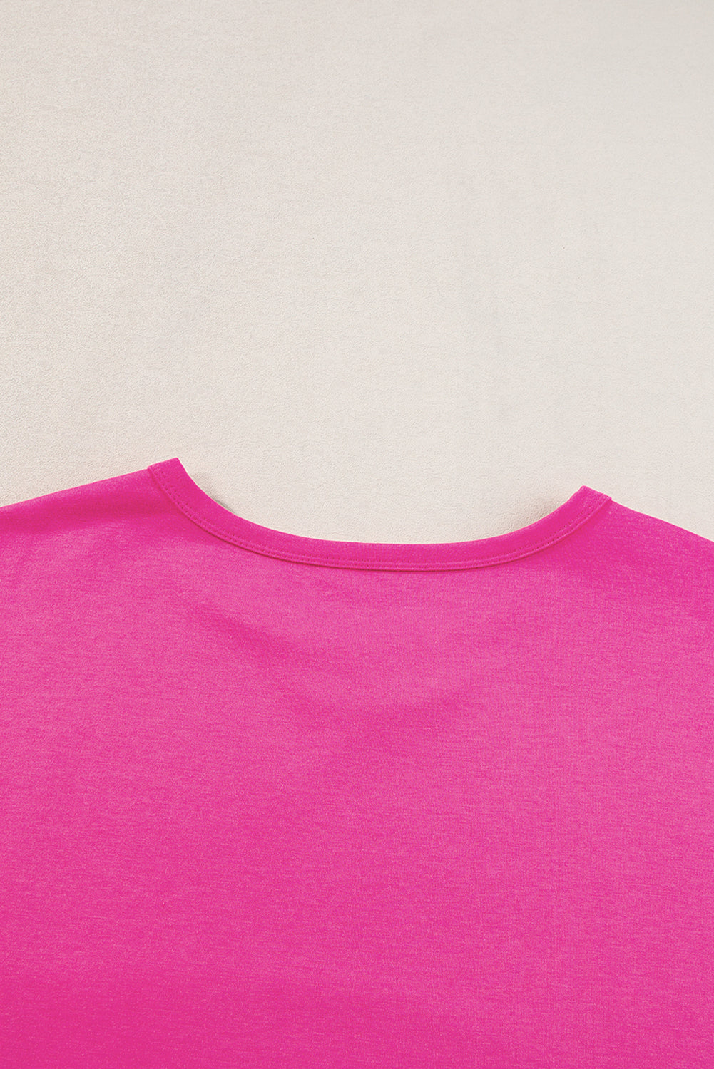 Blue oversized T-shirt from Mommas Hive with patched pocket and exposed seam detailing, made of polyester, cotton, and elastane.