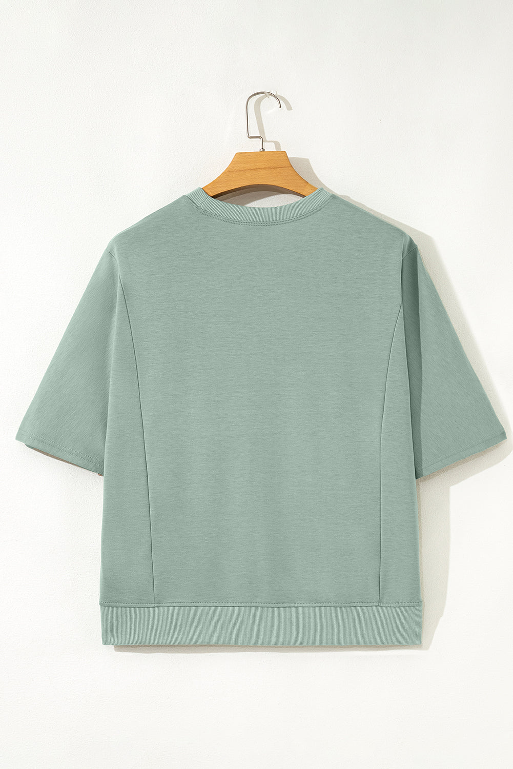 Mommas Hive floral patched half-sleeve tunic top in aqua, polyester, cotton, and elastane, styled with floral patches and a relaxed fit.