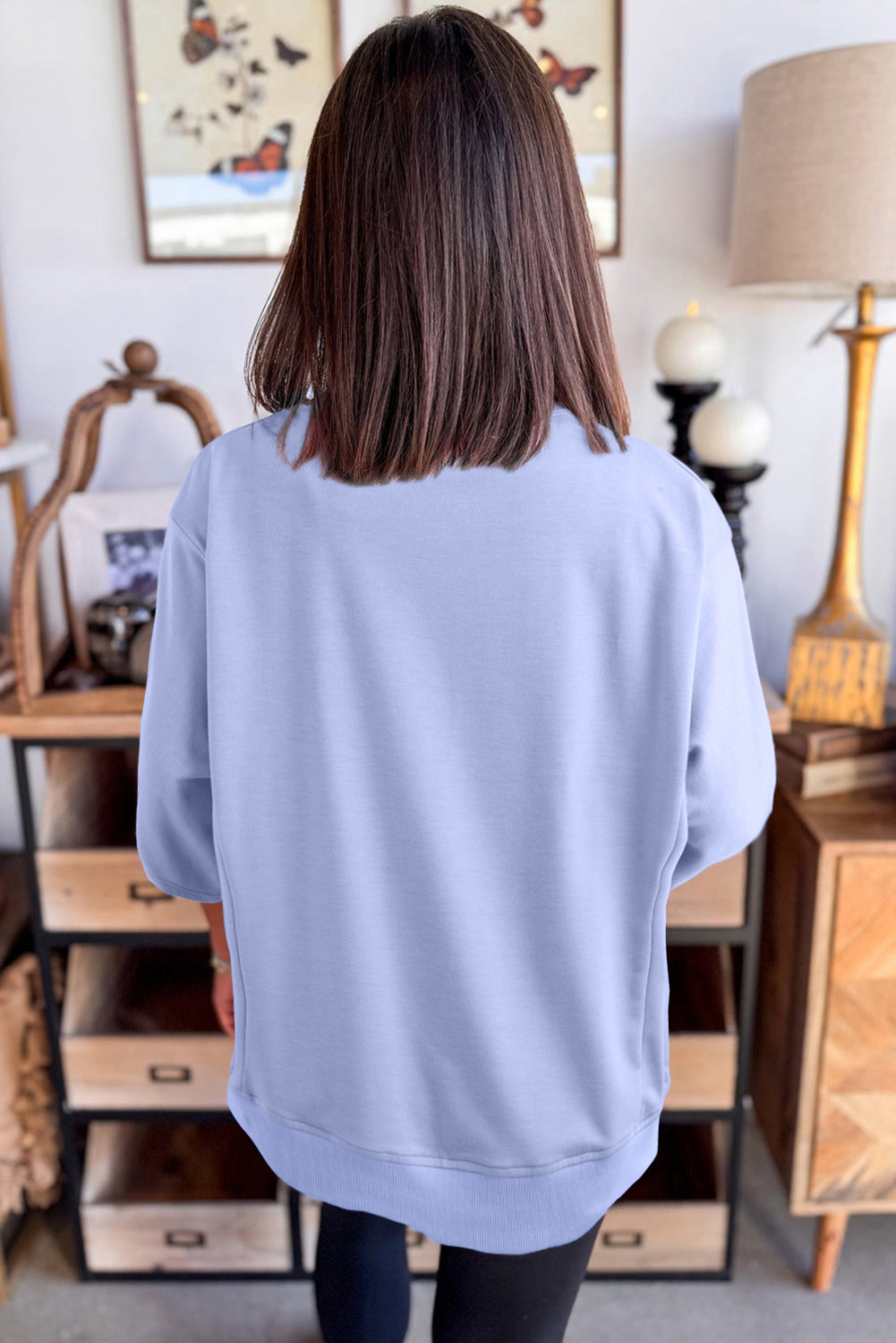 Mommas Hive floral patched half sleeve tunic top in aqua, made of polyester, cotton, and elastane, with a relaxed fit.