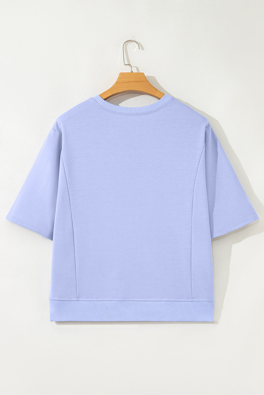 Mommas Hive floral patched half-sleeve tunic top in aqua with polyester, cotton, and elastane, featuring floral patch details.