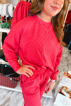 Mommas Hive black checkered textured split pullover top and matching pant set, stylish two-piece outfit with a modern pattern.