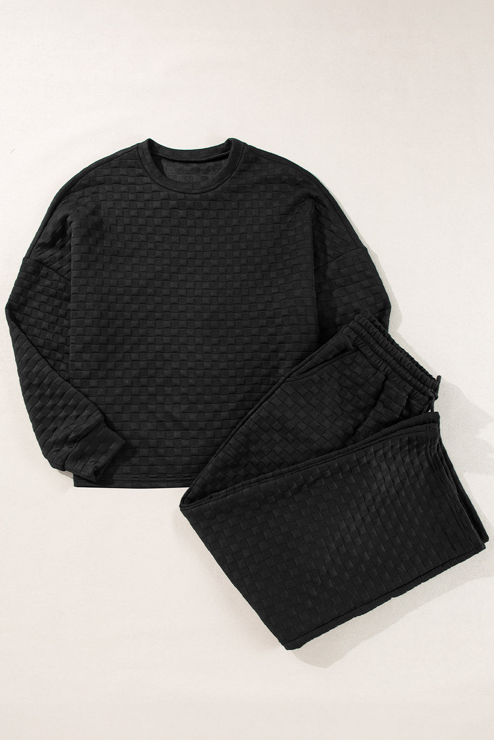 Mommas Hive black checkered textured split pullover top and matching pants set, two-piece casual outfit with elastic waistband.