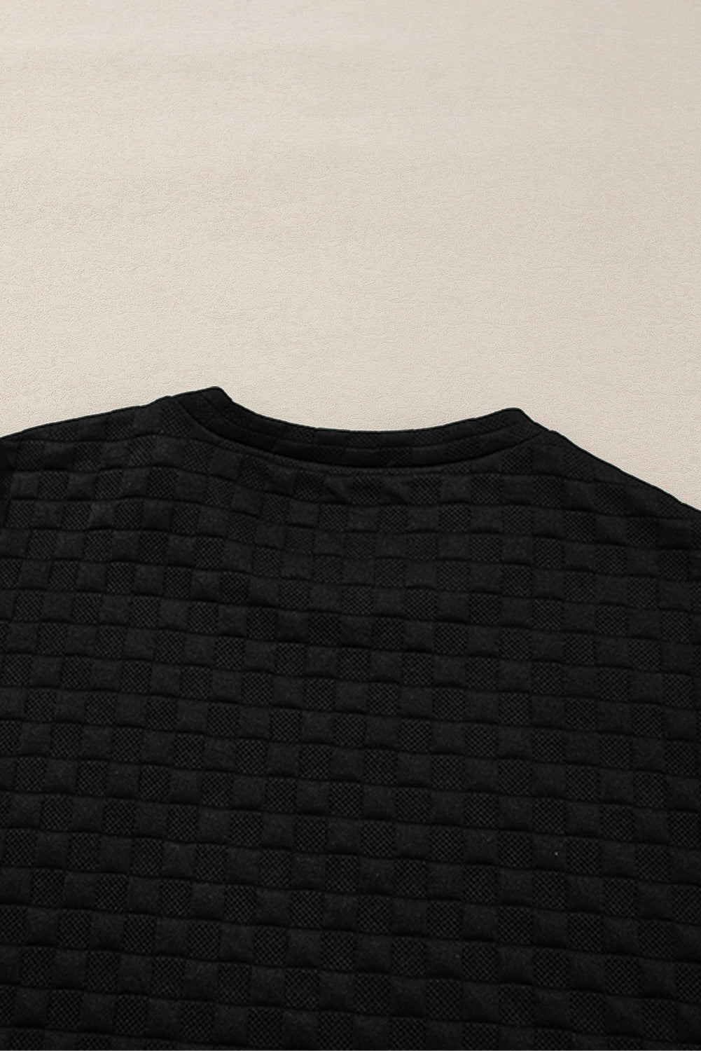 Mommas Hive black checkered textured split pullover top and matching pant set, two-piece casual outfit for women.
