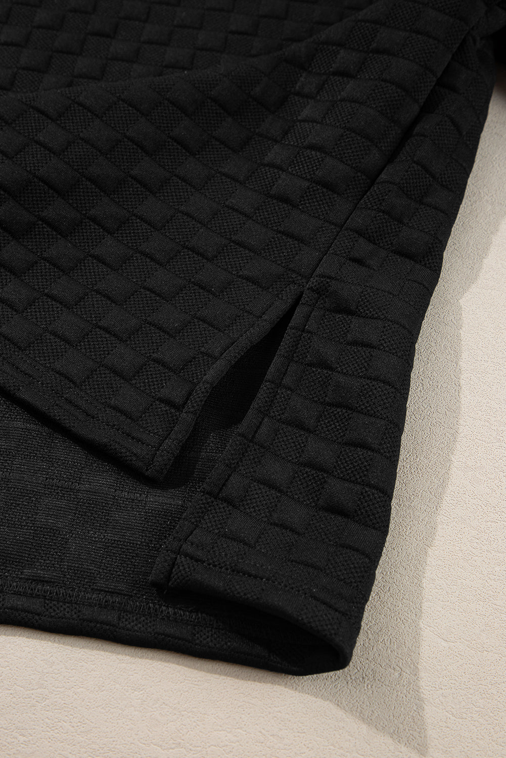 Mommas Hive checkered textured split pullover top and matching pants set in black, made of polyester and elastane, two-piece outfit.