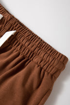 Black and red stripe drop shoulder pullover with matching jogger pants set from Mommas Hive, made of 100% polyester.