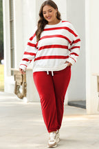 Black stripe drop shoulder pullover and jogger pants set from Mommas Hive, featuring a relaxed fit and comfortable two-piece design.