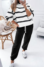 Black stripe drop shoulder pullover and jogger pants set by Mommas Hive, made of 100% polyester, stylish two-piece outfit.