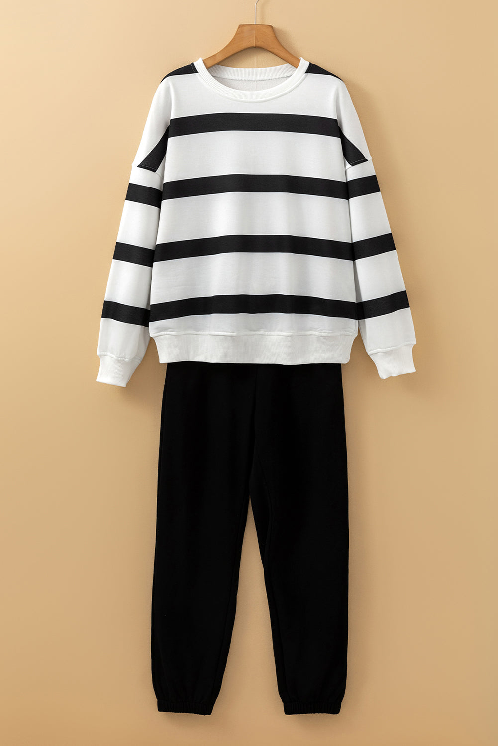 Black and red stripe drop shoulder pullover and jogger pants set by Mommas Hive, featuring a comfortable two-piece polyester outfit.