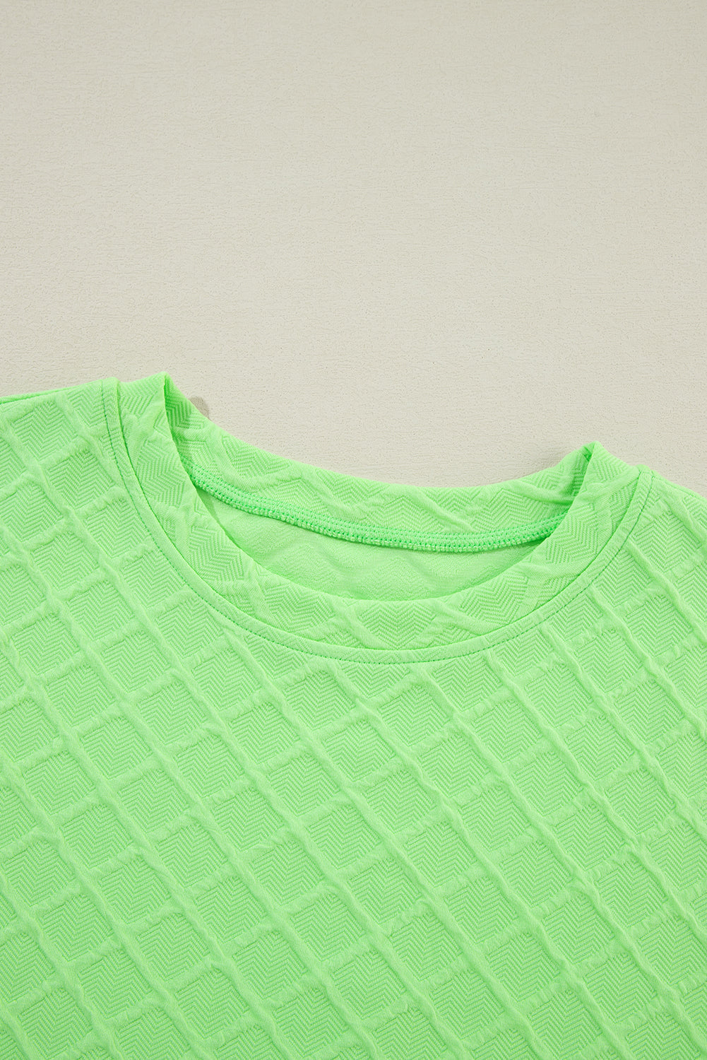 Light green checkered textured tee with matching drawstring shorts, Mommas Hive two-piece short set, casual and comfortable.