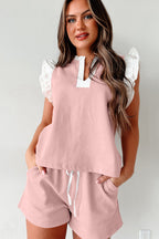 Light pink ruffled top and drawstring shorts set by Mommas Hive, featuring contrast trim and casual two-piece design.