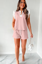 Light pink ruffled top and drawstring shorts set by Mommas Hive, featuring contrast trim and casual two-piece design.