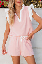 Light pink contrast trim ruffled top and drawstring shorts set by Mommas Hive, two-piece casual outfit for women.
